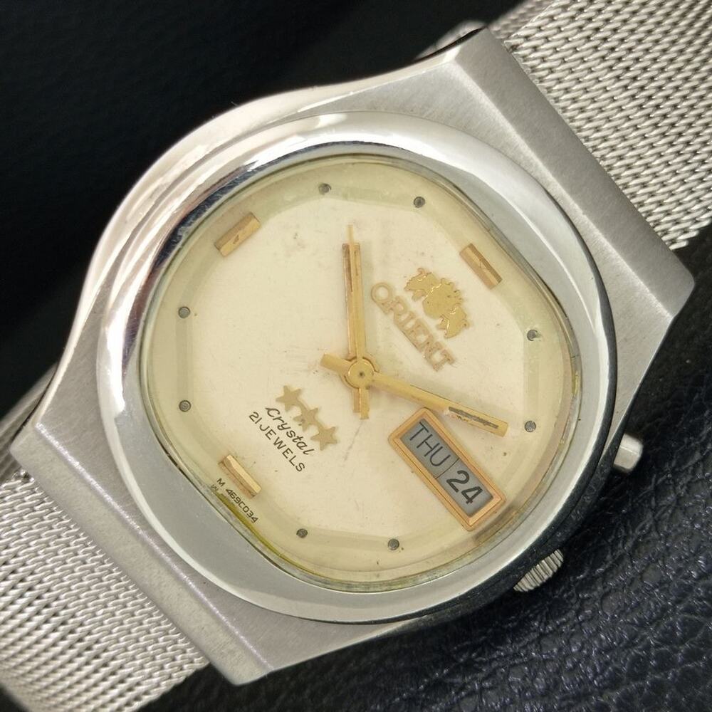 Vintage 1977 Orient Automatic Mens Silver Watch W/daydate & Cream accents